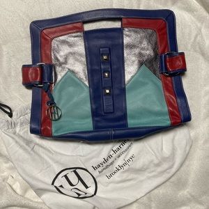 Original Hayden-Harnett large handle clutch.